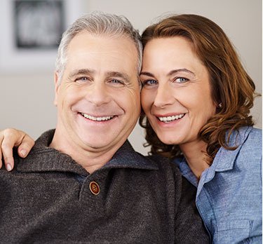 dental crowns happy couple